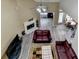 Spacious living room with fireplace, ample seating, and hardwood style floors at 4512 Evan Ct, Hoschton, GA 30548