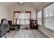 Office with modern decor, hardwood floors, and natural lighting at 4512 Evan Ct, Hoschton, GA 30548