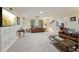 Large living room with plush couches and ample natural light provides a welcoming space at 5030 Princeton Trce, Cumming, GA 30041