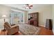Cozy office with a desk, chair, and a bay window providing ample natural light at 5030 Princeton Trce, Cumming, GA 30041