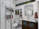 Modern bathroom with a glass-enclosed shower, a vanity, and clean white tile at 920 Memorial Se Dr # 11, Atlanta, GA 30316