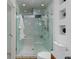 Bathroom with stand up shower with tile accents, rainfall shower head, and built-in shelving at 920 Memorial Se Dr # 11, Atlanta, GA 30316