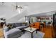 Open-concept living room with a modern staircase and wood floors, perfect for entertaining and relaxing at 920 Memorial Se Dr # 11, Atlanta, GA 30316