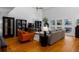 Inviting living room with hardwood floors, comfortable seating, and stylish built-in shelving at 920 Memorial Se Dr # 11, Atlanta, GA 30316