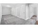 Expansive bedroom showcasing three closets, plush carpeting, and neutral paint at 100 Barnard Pl, Atlanta, GA 30328