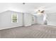 Large bonus room featuring neutral walls, carpet flooring and bright windows at 100 Barnard Pl, Atlanta, GA 30328