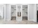 Triple closets with shelving and closet rods; providing organization and storage solutions at 100 Barnard Pl, Atlanta, GA 30328