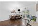 Sunny dining area with built-in seating and glass patio doors that lead to the sunroom at 100 Barnard Pl, Atlanta, GA 30328