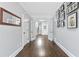 Well-lit foyer featuring hardwood floors and neutral wall paint at 100 Barnard Pl, Atlanta, GA 30328