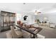 Home office and entertaining space featuring natural light and neutral furnishings at 100 Barnard Pl, Atlanta, GA 30328