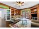 Relaxing living room boasts built-in shelving, natural light, and a comfortable seating arrangement at 100 Barnard Pl, Atlanta, GA 30328