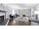 Spacious living room features a fireplace, hardwood floors, and large windows at 100 Barnard Pl, Atlanta, GA 30328