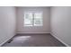 Cozy bedroom with neutral carpet and natural light from window at 1774 Austin Dr, Decatur, GA 30032