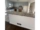 Open kitchen featuring granite counters, gray cabinets, and stainless steel appliances at 1905 Rollingwood Se Dr, Atlanta, GA 30316