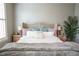 Well-lit primary bedroom with hardwood floors, neutral paint, and comfortable furnishings at 2448 Gatebury Cir, Atlanta, GA 30341