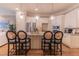 Well-lit kitchen showcasing granite countertops, stainless steel appliances, and modern pendant lights at 2448 Gatebury Cir, Atlanta, GA 30341