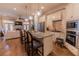 Spacious kitchen with a granite island, stainless steel appliances, and pendant lighting at 2448 Gatebury Cir, Atlanta, GA 30341