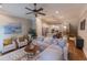 Bright living area with comfortable seating, decorative rug, and open view to the kitchen at 2448 Gatebury Cir, Atlanta, GA 30341