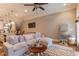 Open-concept living space with a large sofa, stylish decor, and seamless flow to the kitchen at 2448 Gatebury Cir, Atlanta, GA 30341