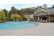 Resort-style pool with lounge chairs and cabana area, perfect for relaxation and entertaining at 2448 Gatebury Cir, Atlanta, GA 30341