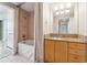 Bathroom featuring modern vanity, tub, and shower at 3338 Peachtree Rd # 1210, Atlanta, GA 30326