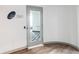 Hallway leading to sky lounge featuring glass door and contemporary decor at 3338 Peachtree Rd # 1210, Atlanta, GA 30326