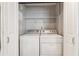 Laundry area features full sized washer and dryer at 3338 Peachtree Rd # 1210, Atlanta, GA 30326