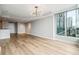 Expansive living space filled with natural light, featuring hardwood floors and panoramic city views at 3338 Peachtree Rd # 1210, Atlanta, GA 30326