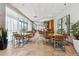 Resident lounge with tables and chairs plus views at 3338 Peachtree Rd # 1210, Atlanta, GA 30326