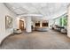 Resident lounge with tables, chairs, and a large central pillar at 3338 Peachtree Rd # 1210, Atlanta, GA 30326