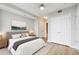 Main bedroom with wood floors and closet at 3338 Peachtree Rd # 1210, Atlanta, GA 30326