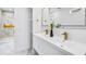 Elegant bathroom featuring double vanity, gold fixtures, and stylish tile for a spa-like experience at 337 Pine Ne St # B, Atlanta, GA 30308