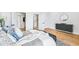 Comfortable bedroom featuring hardwood floors, modern furniture, and ample natural light through open doorway at 337 Pine Ne St # B, Atlanta, GA 30308
