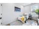 Cozy bedroom featuring a single bed, modern decor, and a sunlit window at 337 Pine Ne St # B, Atlanta, GA 30308