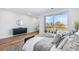 Well-lit bedroom featuring a private balcony, modern furniture, and stylish decor for a comfortable living space at 337 Pine Ne St # B, Atlanta, GA 30308