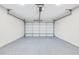 Spacious and clean garage with an epoxy floor, perfect for storage and vehicles at 337 Pine Ne St # B, Atlanta, GA 30308