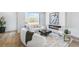 Bright living room with modern fireplace, stylish furniture, and abundant natural light at 337 Pine Ne St # B, Atlanta, GA 30308