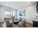Bright living room features a balcony, modern decor, and stylish seating arrangement at 337 Pine Ne St # B, Atlanta, GA 30308
