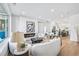 Inviting living room featuring a fireplace, modern decor, and open-concept design to the kitchen at 337 Pine Ne St # B, Atlanta, GA 30308