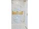 Modern shower featuring a rainfall showerhead, gold hardware, and glass surround for luxurious experience at 337 Pine Ne St # B, Atlanta, GA 30308