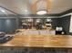 Basement kitchen featuring an island with butcher block countertop and ample cabinet space at 4909 Glenwhite Dr, Duluth, GA 30096