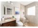 Modern bathroom with tiled shower, glass door and granite countertop at 2685 Flagstone Se Dr, Atlanta, GA 30316