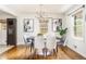 The dining area boasts hardwood floors and decorative wall art, connecting to the kitchen and living spaces at 2685 Flagstone Se Dr, Atlanta, GA 30316