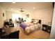 Bedroom with a comfortable bed, desk, and ample workspace for productivity at 2706 Park Land Ln, Snellville, GA 30078
