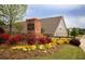 Beautiful community entrance welcomes you with flowering plants at 2706 Park Land Ln, Snellville, GA 30078