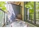 Relaxing balcony with chair and side table, view of the city at 335 W Ponce De Leon Ave # 308, Decatur, GA 30030