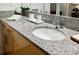 Granite vanity top with a mirror and a sink with stainless-steel faucet at 335 W Ponce De Leon Ave # 308, Decatur, GA 30030