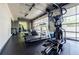 Spacious gym with treadmills and ellipticals with a view of outside at 335 W Ponce De Leon Ave # 308, Decatur, GA 30030