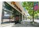 Apartment building exterior with neighborhood commercial businesses at 335 W Ponce De Leon Ave # 308, Decatur, GA 30030