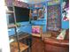 Themed bedroom with custom decorations, tv, and custom desk at 770 Starrsville Rd, Covington, GA 30014